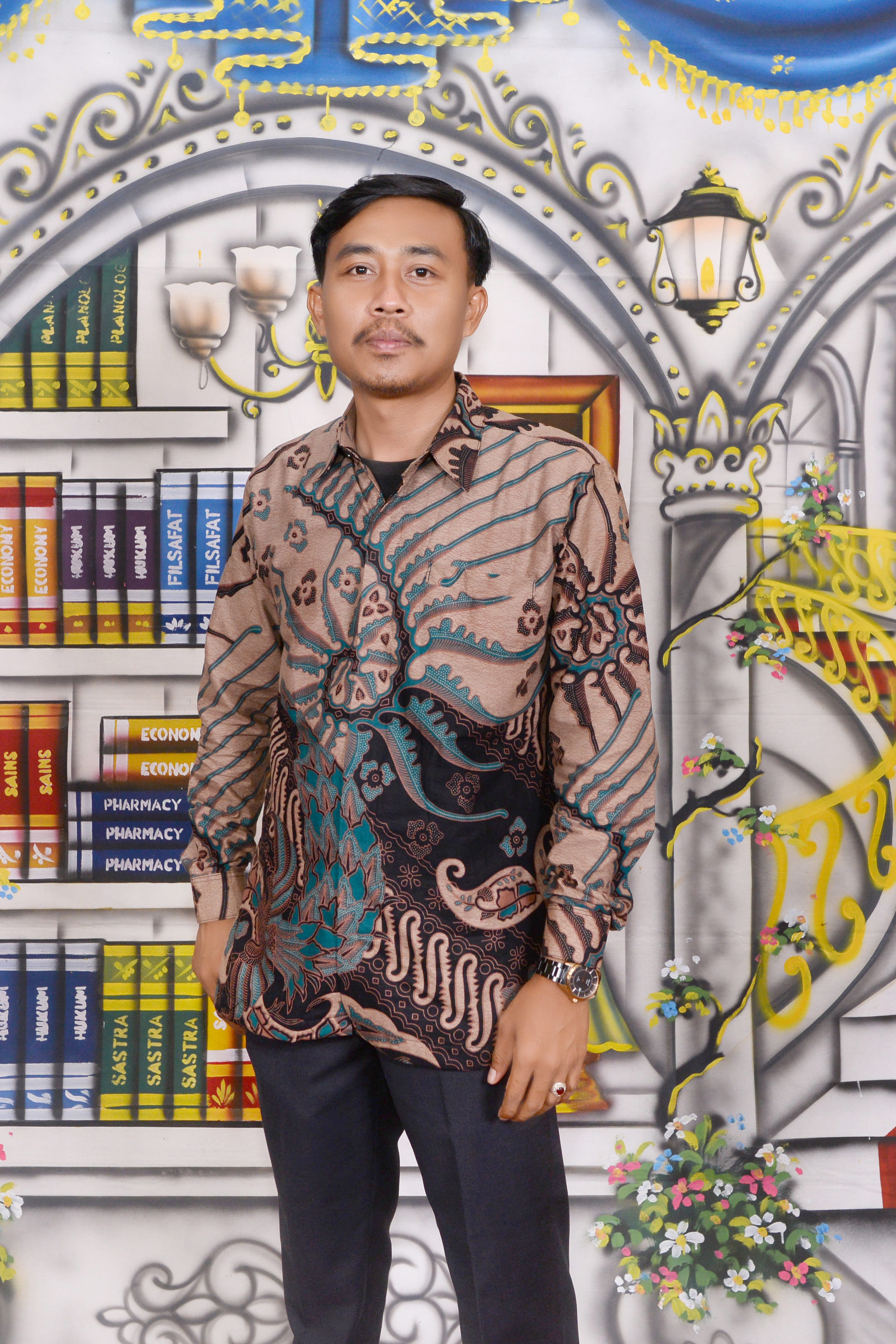 Badarusman, SE.Sy