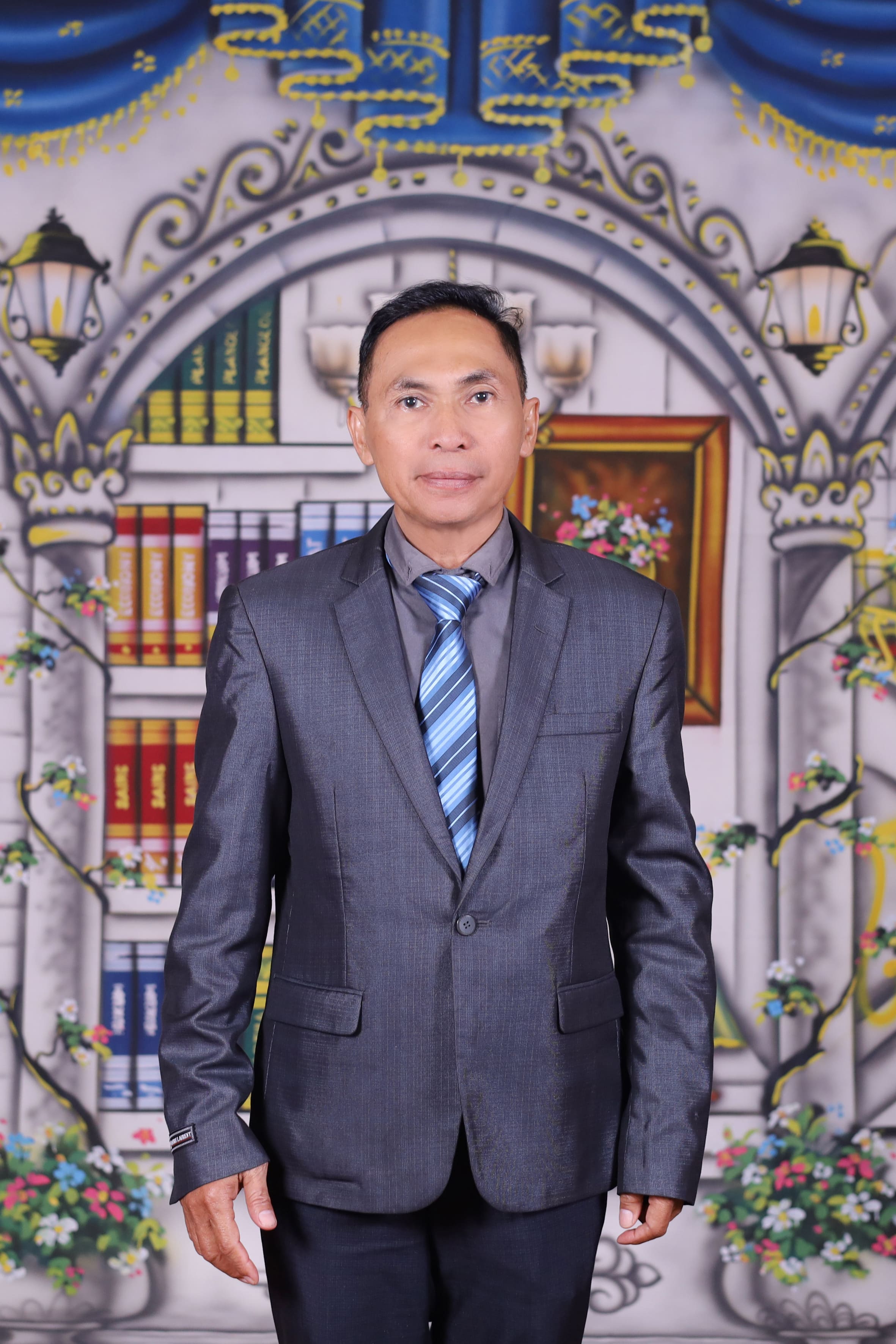 Dr. JUNAIDI, M.Pd.